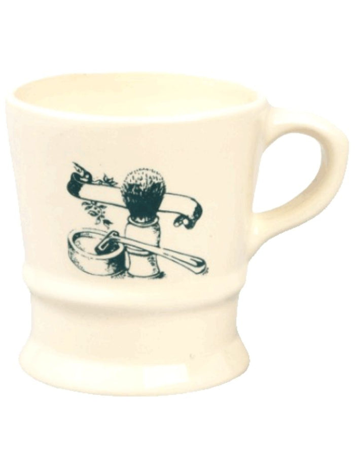 Cream-colored ceramic shave mug with a vintage illustration of a shaving brush, soap, and razor, designed for traditional wet shaving, SKU: CCONK115A