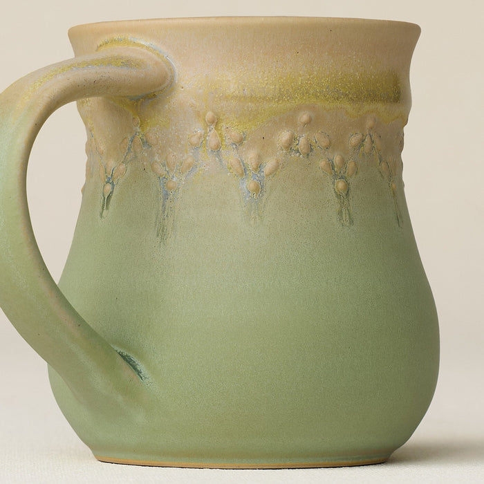Close-up details of hand-thrown mug by Rookwood