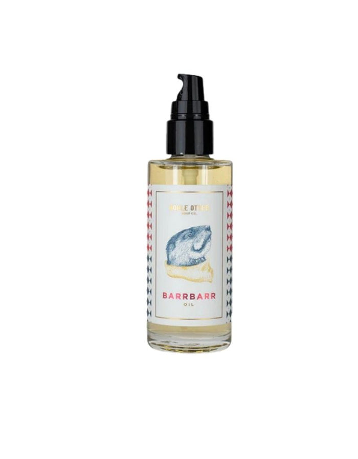 Noble Otter Barrbarr Oil in a clear glass bottle with a black pump dispenser, featuring a label with a hedgehog illustration on lemon slice, for beard and moustache grooming.