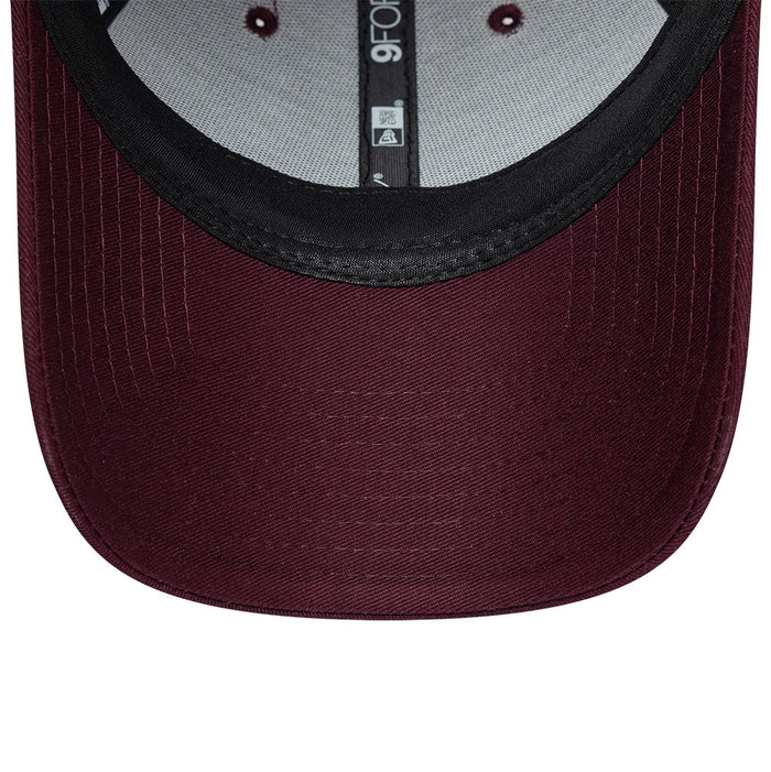 Pictured is this Womens Lacoste X New Era 9FORTY cap in dark purple. 7