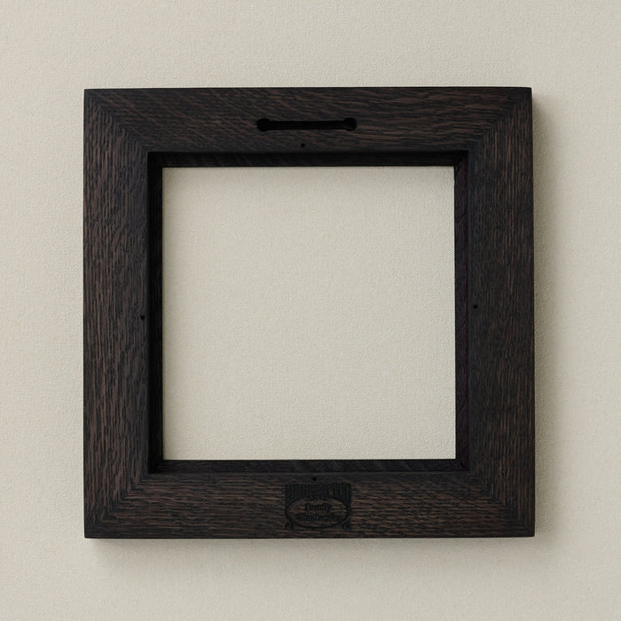 Back of Rookwood 8x8 ebony Craftsman tile frame showing construction and hanging slot