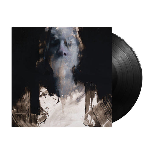 A 180g vinyl record by Capsize partially slides out of a cover displaying abstract art of a ghostly, blurred human face and upper body painted in dark tones, capturing the haunting vibe of "The Essence Of All That Surrounds Me.