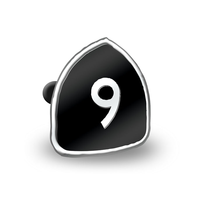 A black guitar pick by Saves The Day with a silver edge and a white number 9 in the center, inspired by Album 9, displayed on a plain white background.