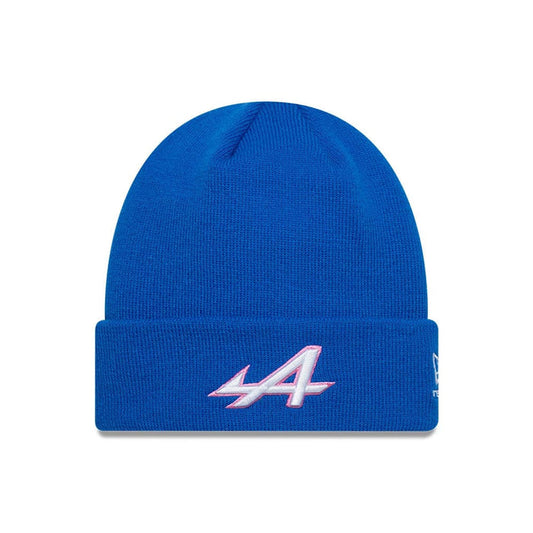 Pictured is this Essential Alpine Racing Cuff Knit Beanie hat in blue. 1