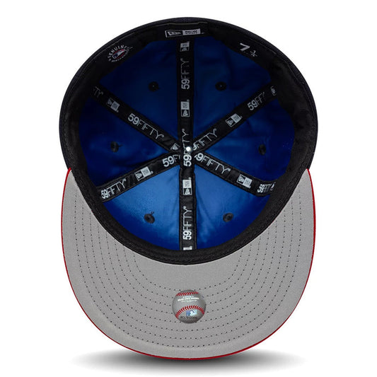 Pictured is this MLB Multi Logo Atlanta Braves 59FIFTY Fitted cap in navy. 2