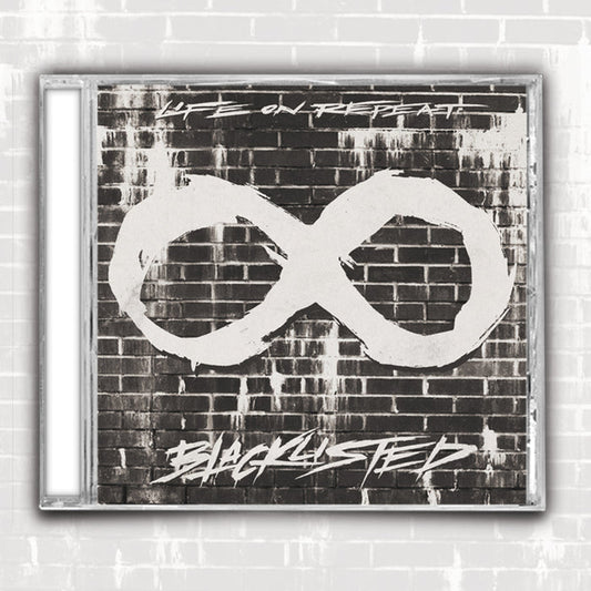 CD cover for Life On Repeats Blacklisted features a black and white brick wall background, a large white infinity symbol, bold handwritten LIFE ON REPEAT at the top, and BLACKLISTED at the bottom. Front does not show track list.