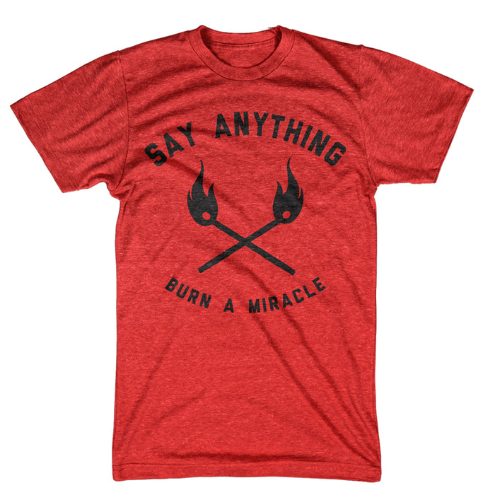 A red Say Anything Tultex "Burn A Miracle" T-shirt featuring black "SAY ANYTHING" text above two crossed torches, with "BURN A MIRACLE" printed below.