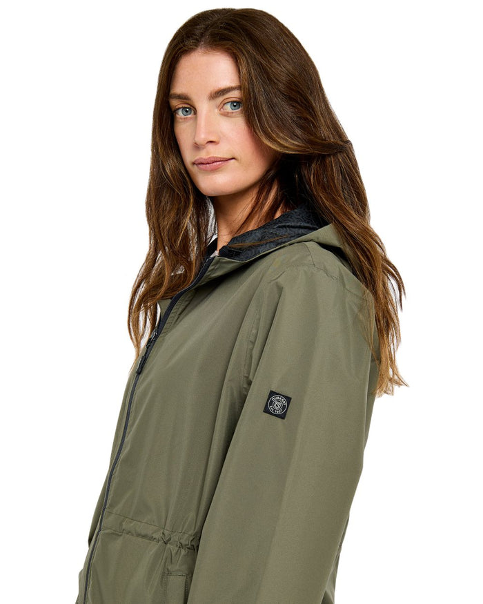 Kelp coloured Dubarry Womens Brookside Hooded Rain Mac on white background #colour_kelp