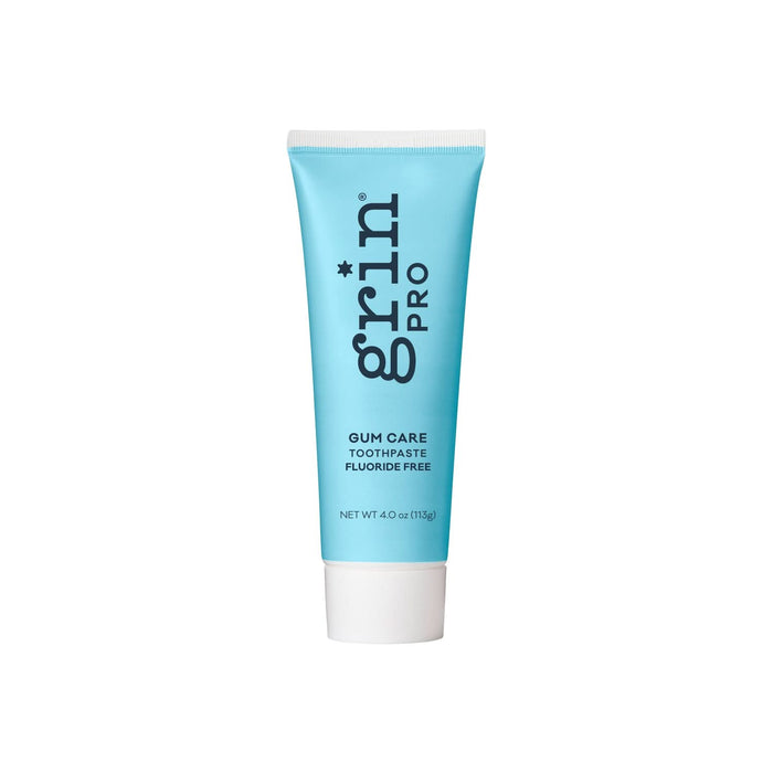 Grin Pro Gum Care Toothpaste 113g tube in light blue with white cap, labeled "Fluoride Free, Net Wt 4.0oz" on white background.