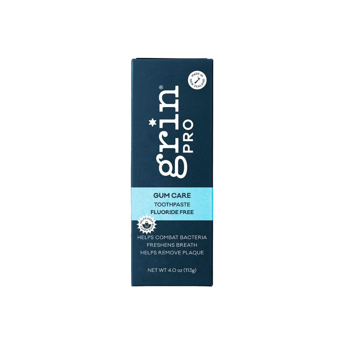 Grin Pro Gum Care Toothpaste 113g in dark navy box with light blue band, fluoride free, made in New Zealand, white background.