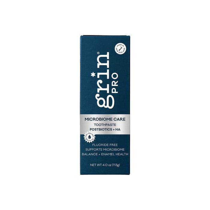 Grin Pro Microbiome Care Toothpaste 113g in dark teal box with silver band, reading "Postbiotics + HA, Fluoride Free" on white background.