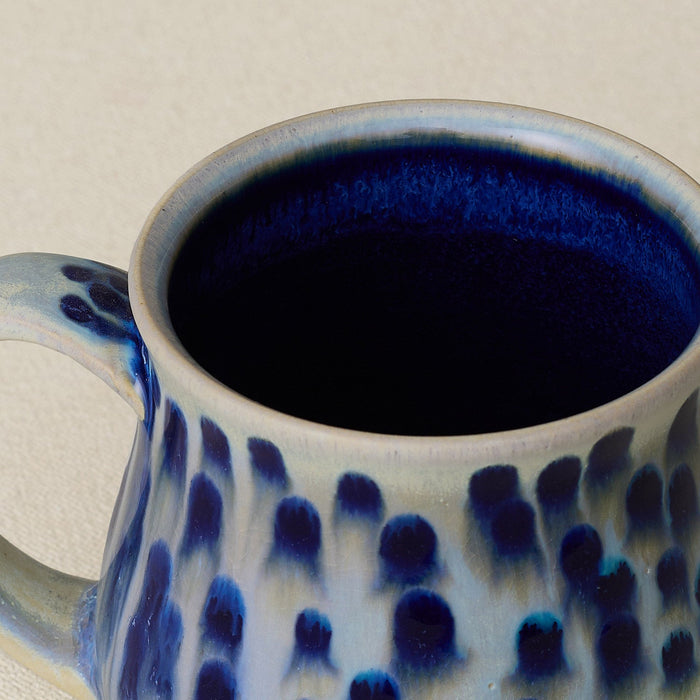 Close-up details of hand-thrown mug by Rookwood