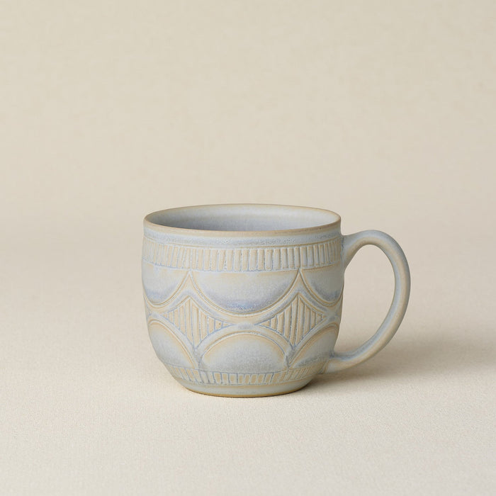 Hand-thrown ceramic mug by Rookwood Pottery