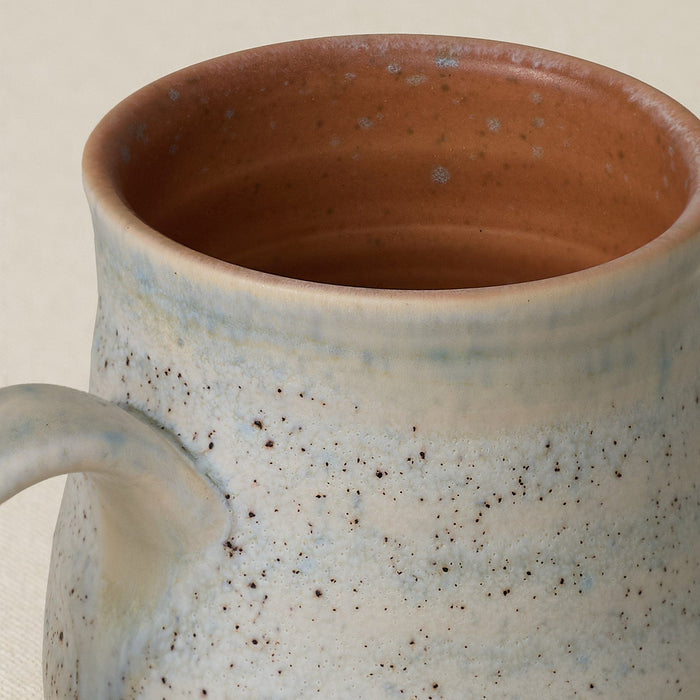 Close-up details of hand-thrown mug by Rookwood