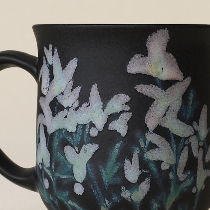 Close-up details of hand-thrown mug by Rookwood