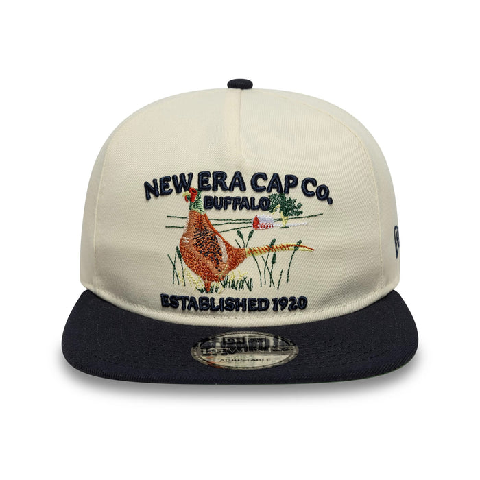 Pictured is this New Era Outdoor Graphic 19TWENTY cap in light beige. 2