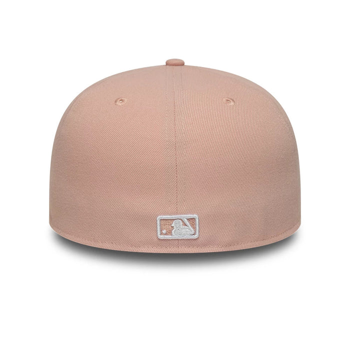 Pictured is this MLB League Essential New York Yankees 59FIFTY Fitted cap in pastel pink. 4