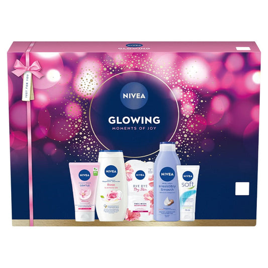 Nivea Glowing Moments of Joy gift set box in pink and navy with five products: Cream Wash, Rose Shower, Face Mask, Body Lotion, Soft cream.