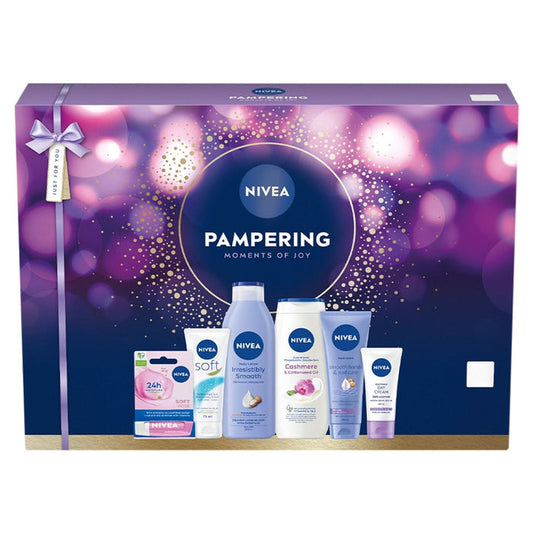 Nivea Pampering Moments of Joy Gift Set box in purple with 6 products: lip balm, Soft cream, body lotion, shower gel, hand cream, day cream.