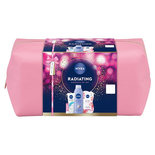 Nivea Radiating Moments of Joy Gift Set in pink toiletry bag with navy wrap showing Soft, Irresistibly Smooth, Bye Bye Dry Skin products, white background