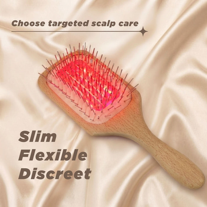 NuGROWS VivaBrush Pro cold laser scalp brush with red light, wooden handle, on cream satin. Text: "Choose targeted scalp care. Slim Flexible Discreet"
