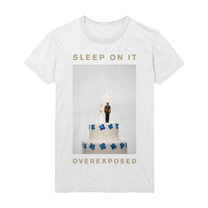 The Sleep On It Overexposed T-Shirt showcases a striking wedding cake with a flaming groom, finished with bold gold “SLEEP ON IT” and “OVEREXPOSED” text.