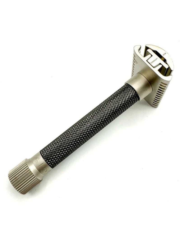 Safety razor with textured handle and adjustable head