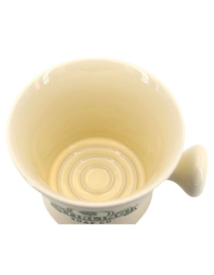 Top view of cream ceramic shaving mug showing smooth interior surface, ideal for creating rich shaving lather