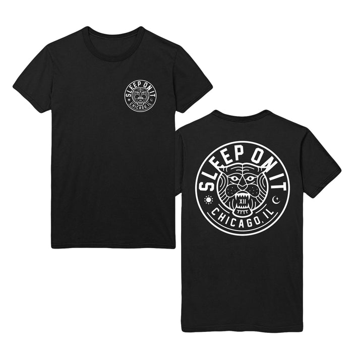 Sleep On It black Gildan Softstyle t-shirt with a white circular logo: “SLEEP ON IT CHICAGO, IL” and a bulldog face on the back, plus a smaller matching logo on the front left chest.