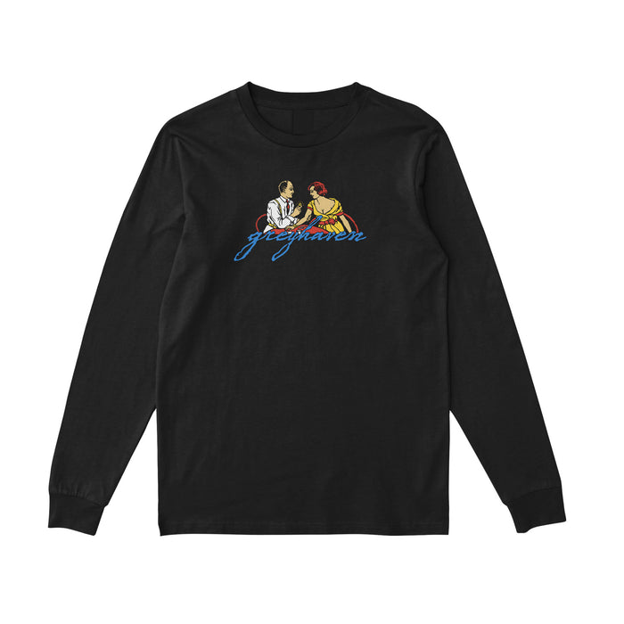 Black long sleeve shirt that depicts a couple sitting at a table at what is probably a cafe.  There is blue cursive text below the couple  that reads greyhaven.
