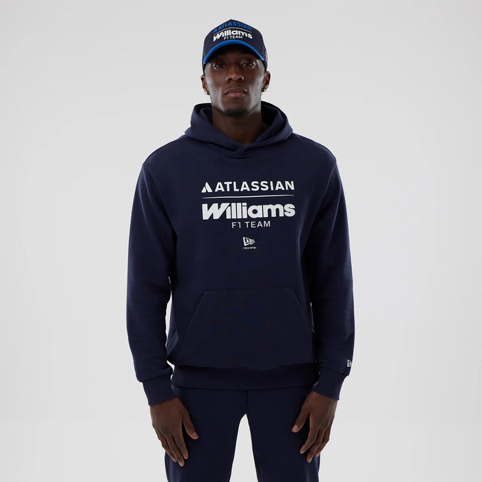 The model is wearing this Atlassian Williams F1 Team Oversized Pullover Hoodie in navy. 1