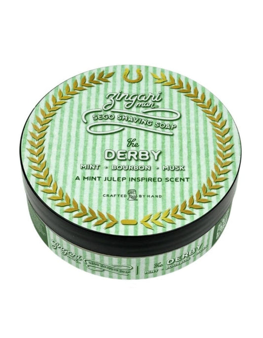 Green tin of Zingari Man The Derby Sego Shaving Soap with mint, bourbon, and musk scent, featuring a striped pattern and gold laurel design